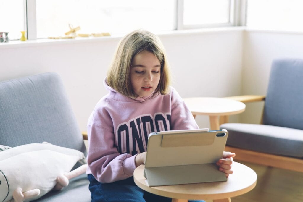 kid taking online lesson with GoEast Kids
