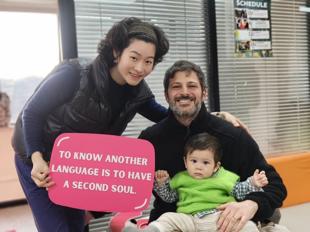 GoEast Mandarin student attending a community event with their child