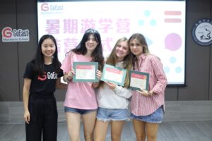 Italian school group graduation ceremony holding certificates at GoEast Kids