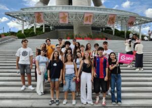 Italian school group posing in front of the Oriental Pearl Tower in Shanghai