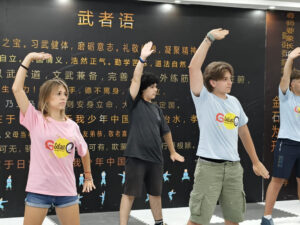 Italian school group students practicing kung fu during a cultural activity