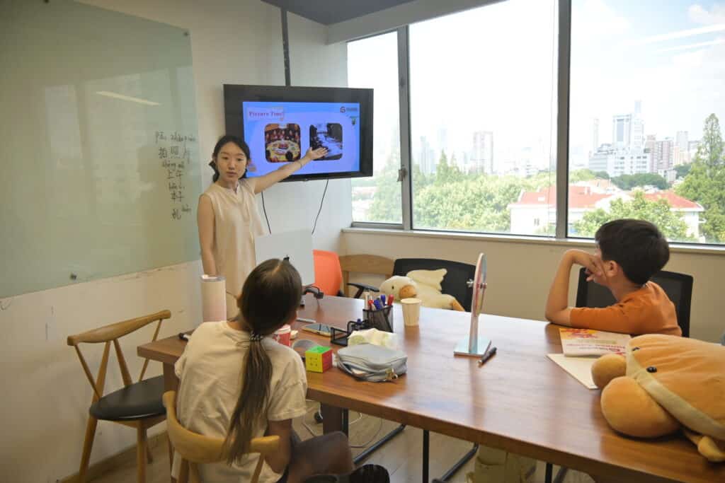 Small-group Mandarin lesson at GoEast Kids camp in Shanghai