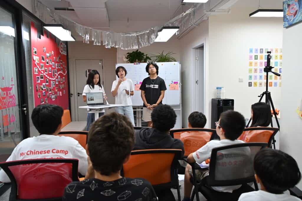 A camper giving a final presentation in Chinese at GoEast Kids camp